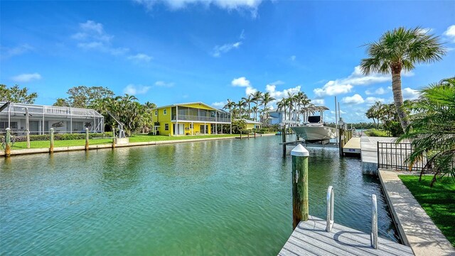 795 Marbury Ln, Longboat Key, FL 34228 - dock area featuring a water view and boat lift