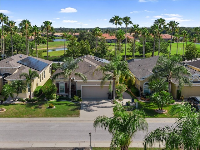 305 Siena Vista Pl, Sun City Center, FL 33573 - aerial perspective of suburban area featuring a nearby body of water
