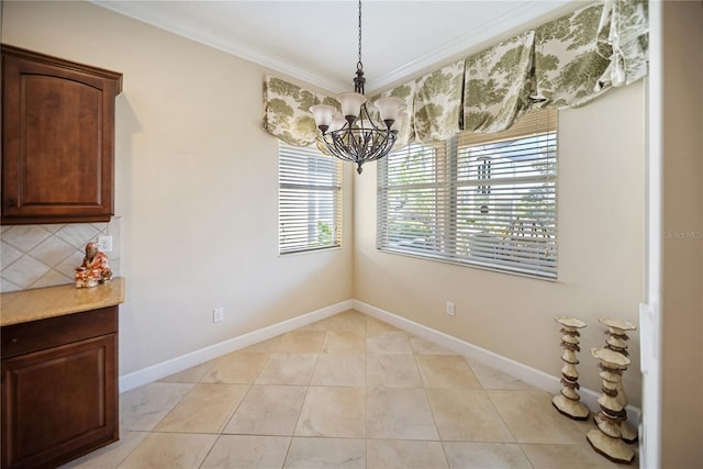 305 Siena Vista Pl, Sun City Center, FL 33573 - unfurnished dining area featuring crown molding and a chandelier