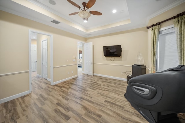 305 Siena Vista Pl, Sun City Center, FL 33573 - living room featuring crown molding, a ceiling fan, a raised ceiling, wood finished floors, and recessed lighting