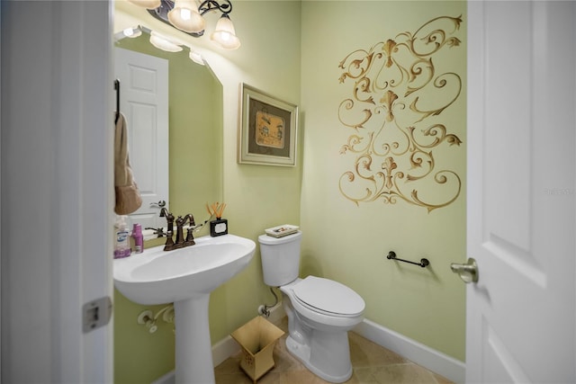 305 Siena Vista Pl, Sun City Center, FL 33573 - half bath featuring baseboards and tile patterned floors
