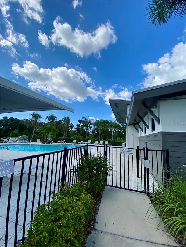 11613 Woodleaf Dr, Lakewood Ranch, FL 34211 - balcony featuring view of pool area
