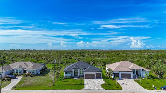 1167 Boundary Blvd, Rotonda West, FL 33947 - view of subject property with a forest