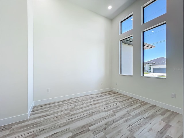 1167 Boundary Blvd, Rotonda West, FL 33947 - spare room featuring light wood finished floors and recessed lighting