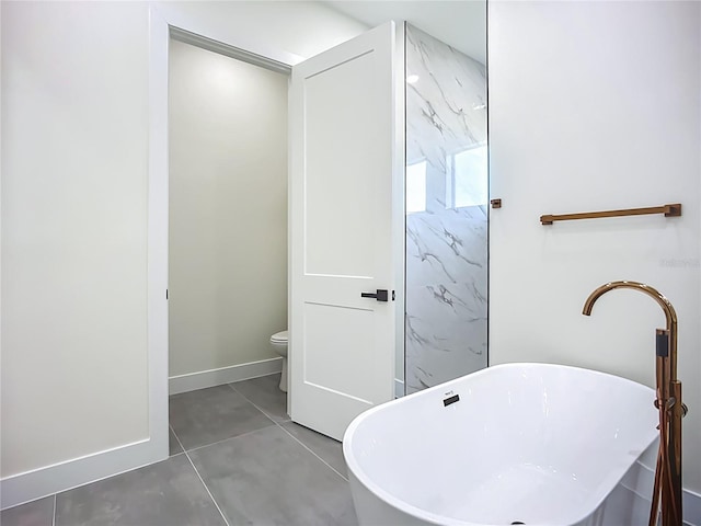 1167 Boundary Blvd, Rotonda West, FL 33947 - bathroom with a freestanding bath and tile patterned floors