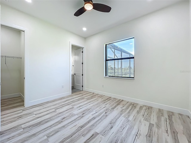 1167 Boundary Blvd, Rotonda West, FL 33947 - unfurnished bedroom featuring light wood-type flooring, a closet, recessed lighting, and ceiling fan