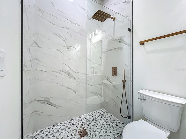 1167 Boundary Blvd, Rotonda West, FL 33947 - bathroom with toilet and a marble finish shower