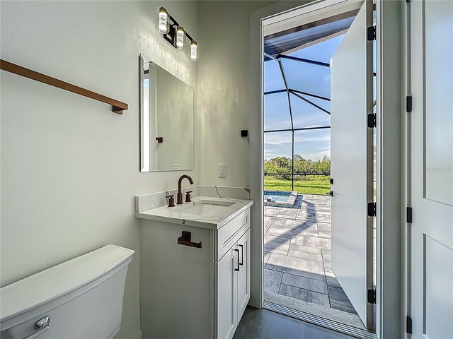 1167 Boundary Blvd, Rotonda West, FL 33947 - bathroom with toilet and vanity