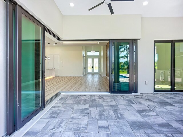 1167 Boundary Blvd, Rotonda West, FL 33947 - interior space with french doors and ceiling fan