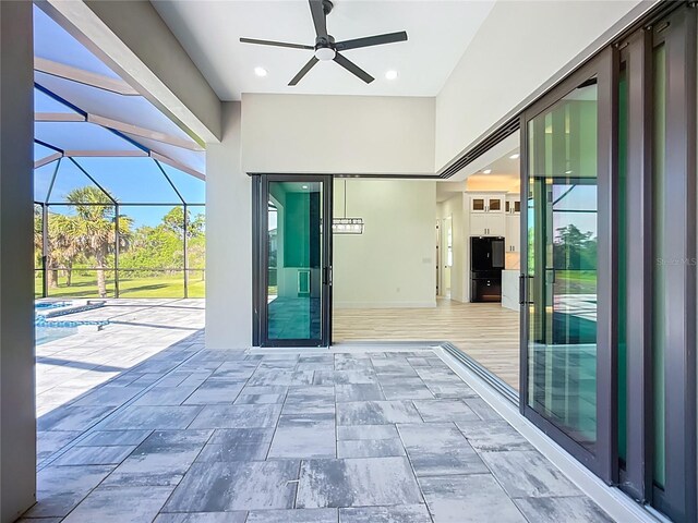 1167 Boundary Blvd, Rotonda West, FL 33947 - view of patio / terrace featuring ceiling fan, a lanai, and a pool with connected hot tub