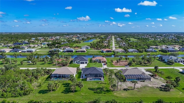 1167 Boundary Blvd, Rotonda West, FL 33947 - aerial perspective of suburban area featuring a nearby body of water
