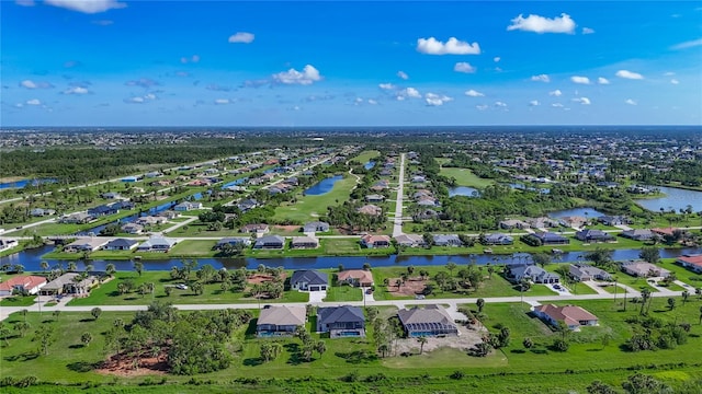 1167 Boundary Blvd, Rotonda West, FL 33947 - aerial view of residential area with a nearby body of water
