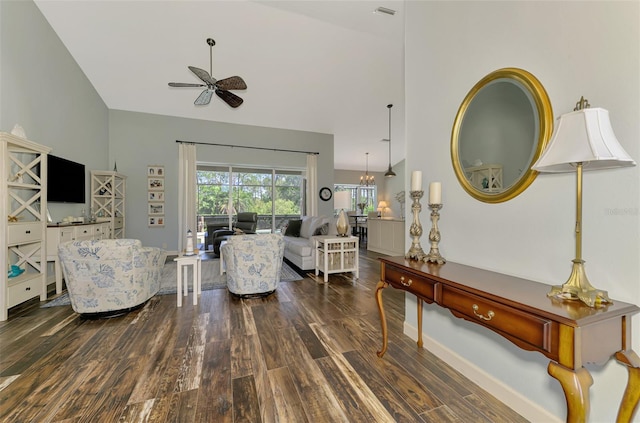 7302 Dunes Ct, Bradenton, FL 34202 - living area featuring ceiling fan, wood finished floors, and high vaulted ceiling