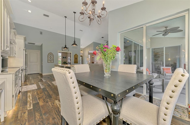 7302 Dunes Ct, Bradenton, FL 34202 - dining space featuring ceiling fan, dark wood-type flooring, a chandelier, lofted ceiling, and recessed lighting