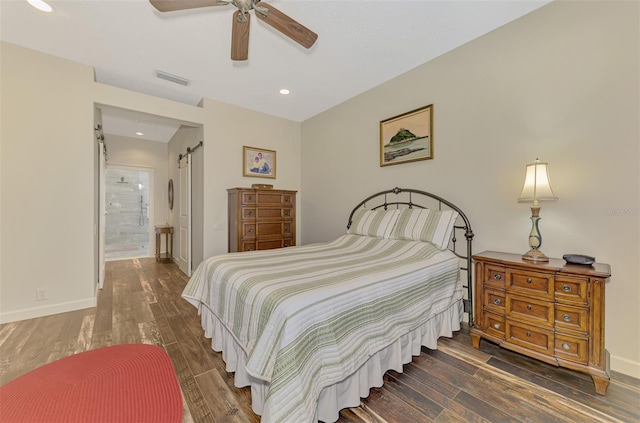 7302 Dunes Ct, Bradenton, FL 34202 - bedroom featuring a barn door, wood finished floors, recessed lighting, connected bathroom, and a ceiling fan