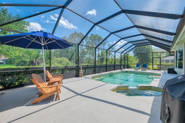 7302 Dunes Ct, Bradenton, FL 34202 - view of pool with a grill, a patio, a pool with connected hot tub, and a lanai