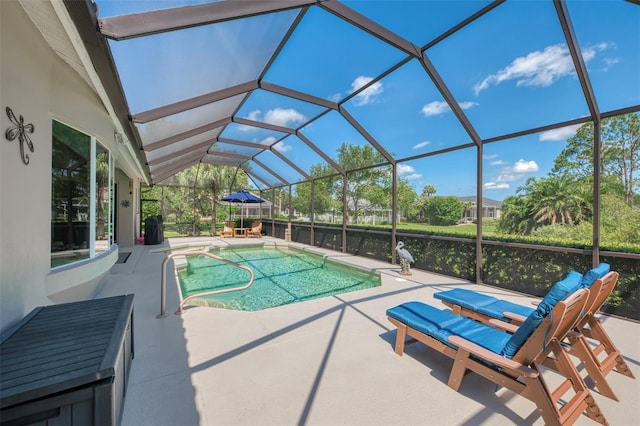 7302 Dunes Ct, Bradenton, FL 34202 - swimming pool featuring a patio and glass enclosure