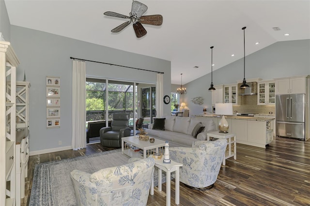 7302 Dunes Ct, Bradenton, FL 34202 - living area featuring ceiling fan, dark wood-style floors, high vaulted ceiling, a chandelier, and recessed lighting