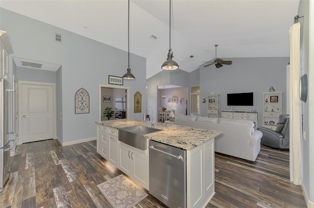 7302 Dunes Ct, Bradenton, FL 34202 - kitchen featuring stainless steel dishwasher, ceiling fan, white cabinets, light stone countertops, and dark wood-type flooring