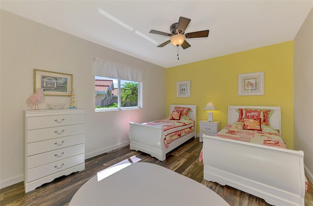 7302 Dunes Ct, Bradenton, FL 34202 - bedroom with wood finished floors and ceiling fan