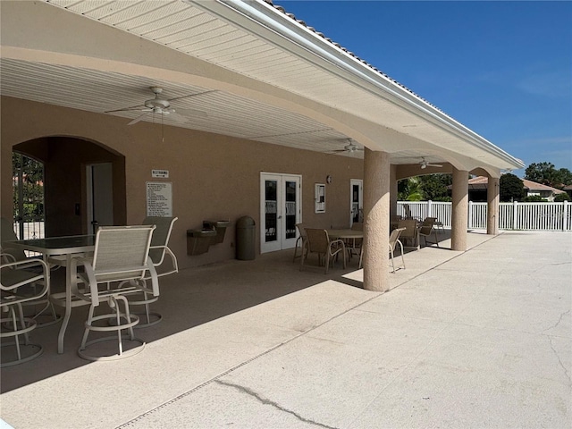 7302 Dunes Ct, Bradenton, FL 34202 - view of patio / terrace with outdoor dining space, ceiling fan, and french doors