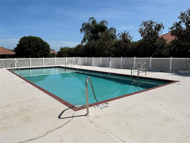 7302 Dunes Ct, Bradenton, FL 34202 - community pool with a patio