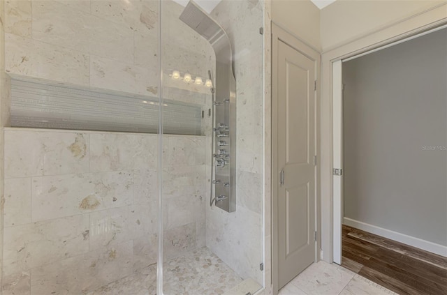 7302 Dunes Ct, Bradenton, FL 34202 - full bath featuring a shower stall and wood finished floors