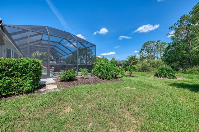 7302 Dunes Ct, Bradenton, FL 34202 - view of green lawn with glass enclosure