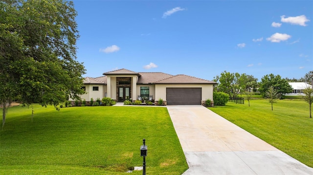 16630 Willow Point Ct, Alva, FL 33920 - view of front of property with stucco siding, french doors, concrete driveway, a garage, and a tiled roof