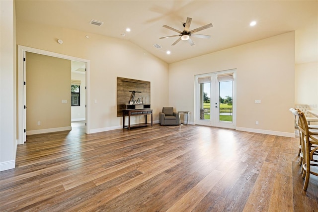 16630 Willow Point Ct, Alva, FL 33920 - living room with ceiling fan, vaulted ceiling, wood finished floors, recessed lighting, and french doors