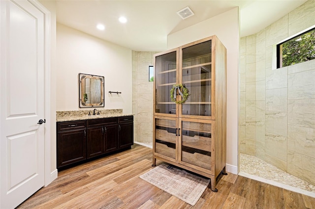 16630 Willow Point Ct, Alva, FL 33920 - bathroom with vanity, wood finished floors, recessed lighting, and walk in shower