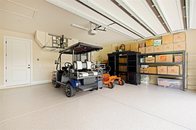 16630 Willow Point Ct, Alva, FL 33920 - garage featuring a garage door opener