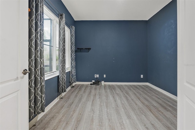2347 123rd Pl E, Parrish, FL 34219 - spare room featuring wood finished floors and baseboards