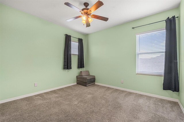 2347 123rd Pl E, Parrish, FL 34219 - carpeted empty room with plenty of natural light and ceiling fan