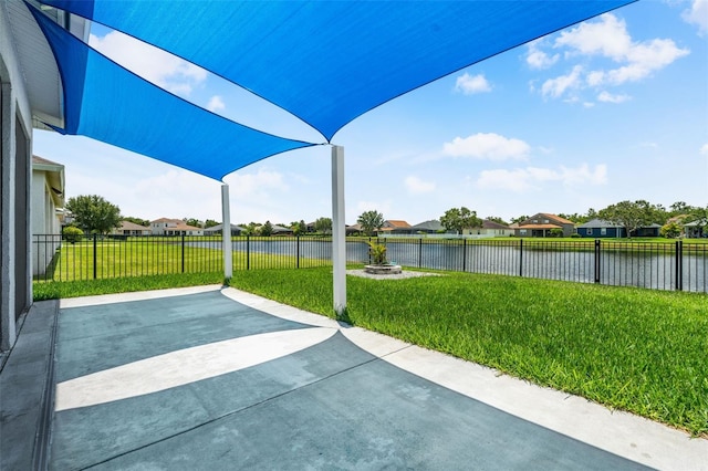 2347 123rd Pl E, Parrish, FL 34219 - fenced backyard featuring a water view, a residential view, and a patio area