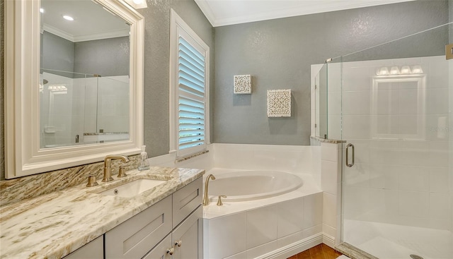 13220 Swiftwater Way, Lakewood Ranch, FL 34211 - bathroom with ornamental molding, a bath, a shower stall, vanity, and a textured wall