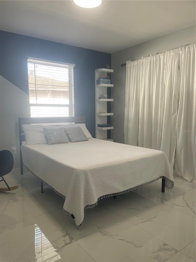 5848 Milton Ave, Sarasota, FL 34243 - bedroom with marble look tiles