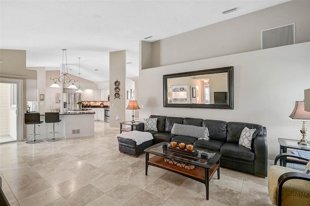 4733 Spring Meadow Ln, Sarasota, FL 34233 - living room featuring lofted ceiling