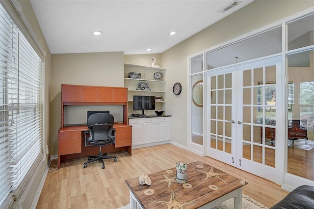 4733 Spring Meadow Ln, Sarasota, FL 34233 - office area featuring french doors, light wood-style floors, and recessed lighting