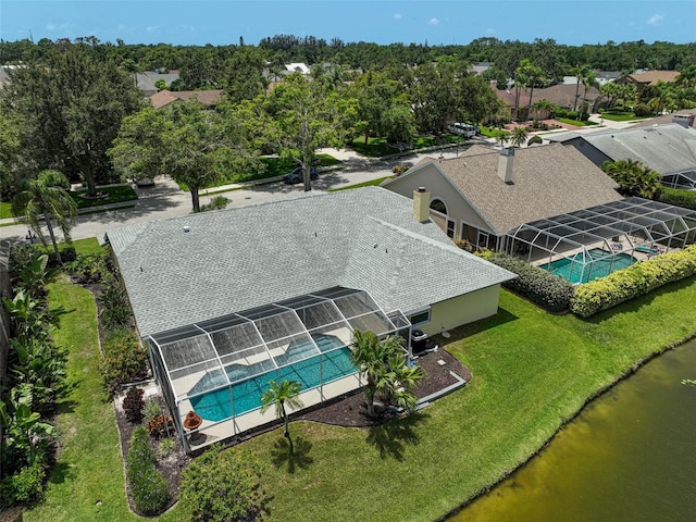4733 Spring Meadow Ln, Sarasota, FL 34233 - aerial view of residential area with a pool area and a tree filled landscape