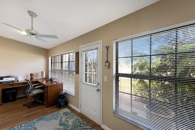 2904 64th St W Unit 2904, Bradenton, FL 34209 - home office featuring wood finished floors, vaulted ceiling, and a ceiling fan