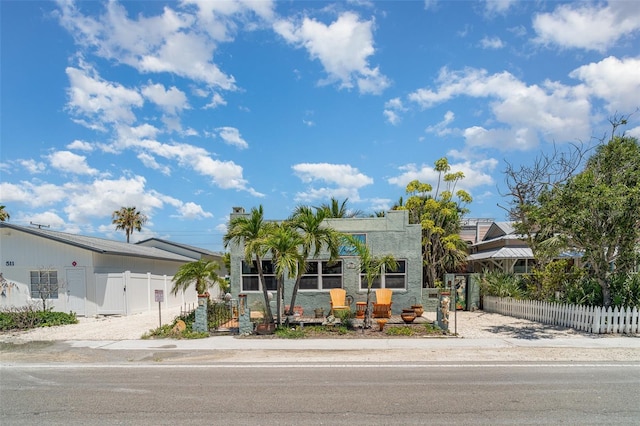 509 Pine Ave Unit A, Anna Maria, FL 34216 - view of front of home featuring a fenced front yard and a gate