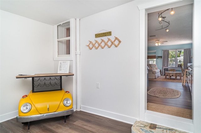 509 Pine Ave Unit A, Anna Maria, FL 34216 - sitting room featuring dark wood-style flooring and ceiling fan