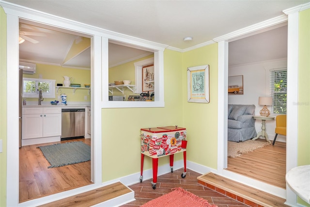 509 Pine Ave Unit A, Anna Maria, FL 34216 - corridor with wood finished floors, crown molding, and an AC wall unit