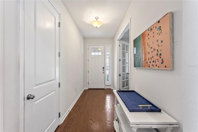 11434 Spring Gate Trl, Bradenton, FL 34211 - foyer entrance featuring dark wood-type flooring and baseboards