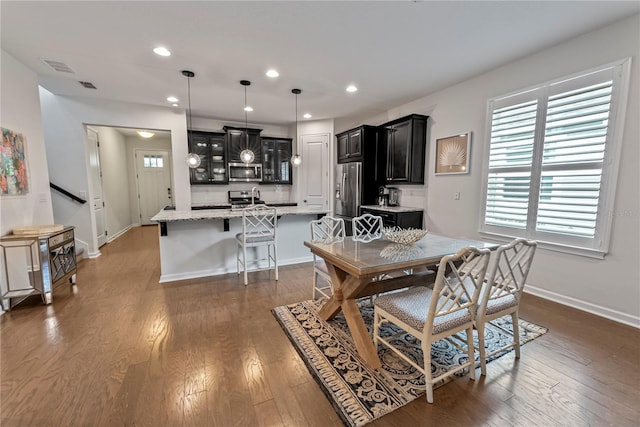 11434 Spring Gate Trl, Bradenton, FL 34211 - dining area featuring plenty of natural light, wood finished floors, and recessed lighting