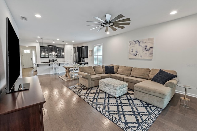 11434 Spring Gate Trl, Bradenton, FL 34211 - living area featuring a ceiling fan, wood finished floors, and recessed lighting