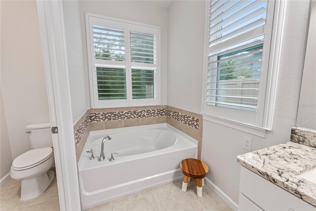 11434 Spring Gate Trl, Bradenton, FL 34211 - bathroom featuring a bath, vanity, plenty of natural light, and tile patterned floors