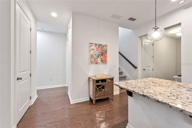 11434 Spring Gate Trl, Bradenton, FL 34211 - kitchen with dark wood-style flooring, recessed lighting, light stone countertops, and pendant lighting