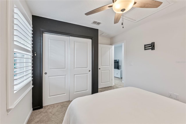 11434 Spring Gate Trl, Bradenton, FL 34211 - bedroom featuring light colored carpet, attic access, a closet, and ceiling fan